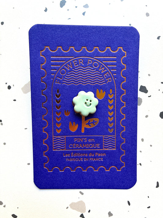 Pin’s en céramique fleur smiley vert pastel