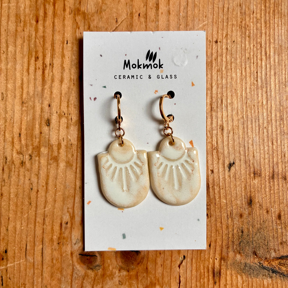 Boucles d'oreilles en céramique soleil blanc