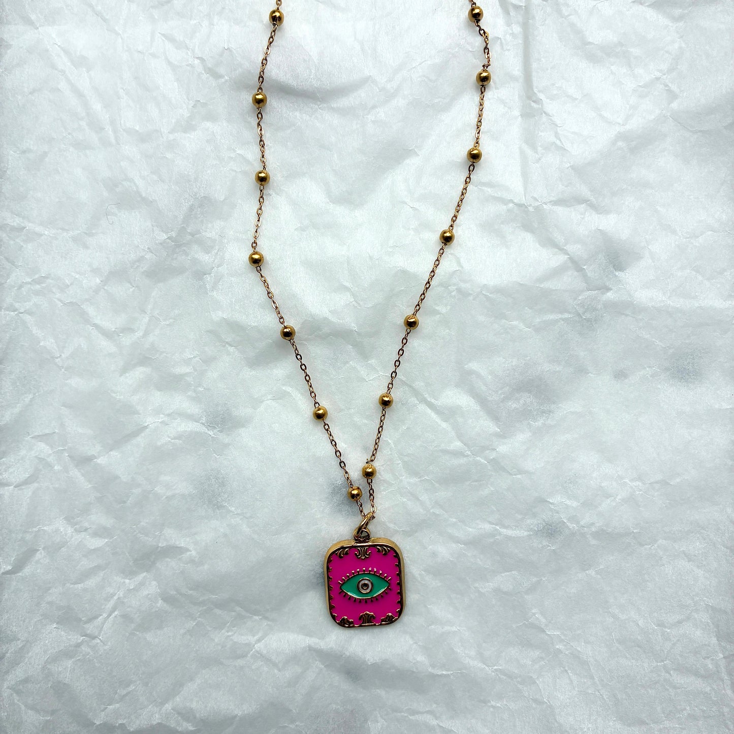 Collier Oeil fuschia