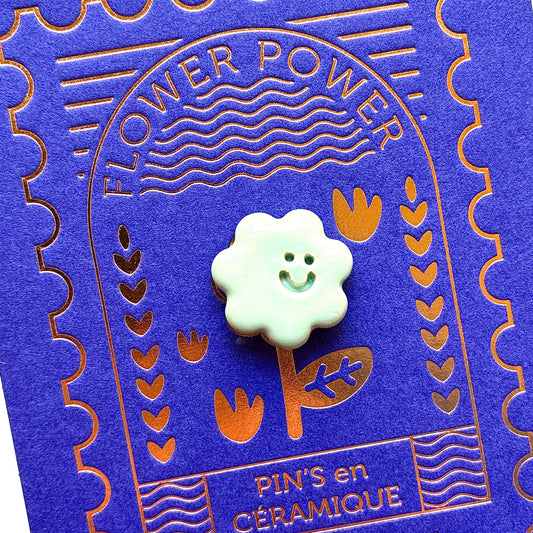 Pin’s en céramique fleur smiley vert pastel
