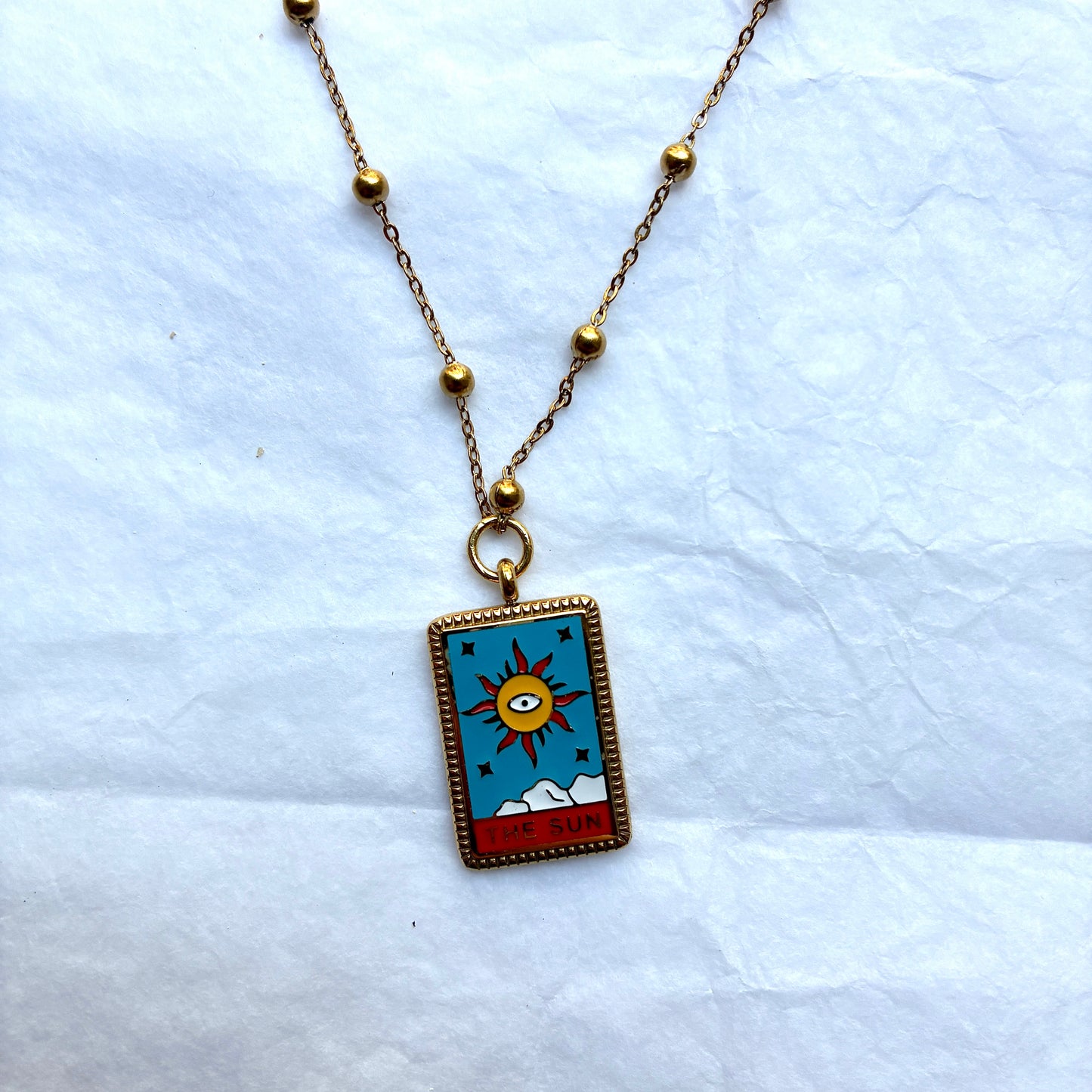 Collier médaillon soleil