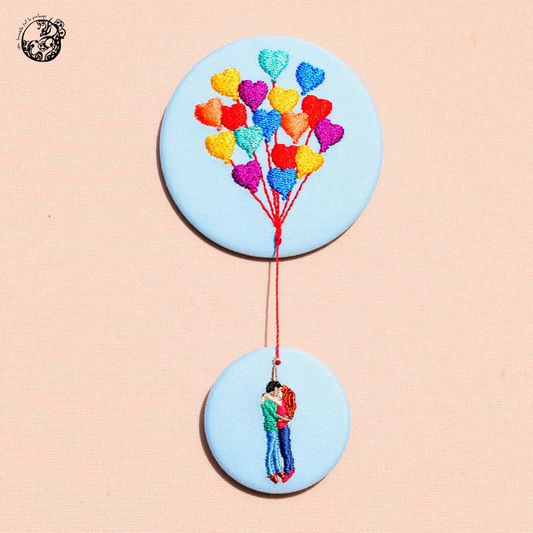 Duo de broches L’amour rend léger