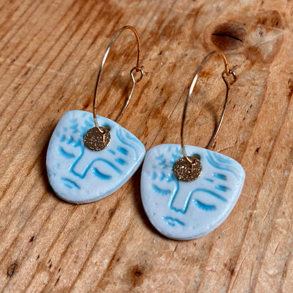 Boucles d'oreilles en céramique visage bleu