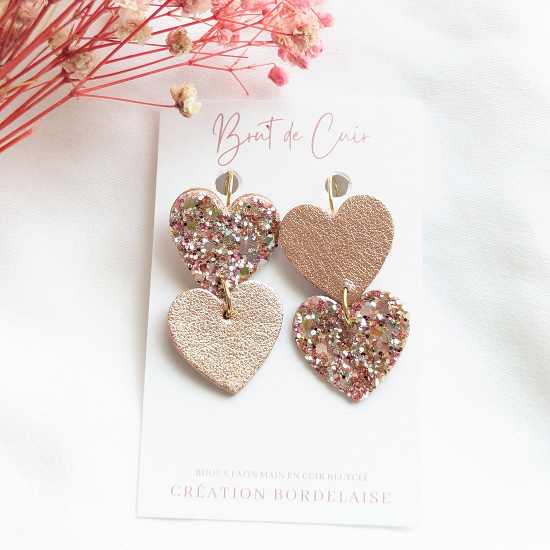 Boucles d'oreilles double coeurs rose doré