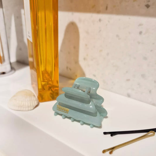 Pince à cheveux wavy mint piscine