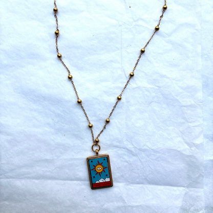 Collier médaillon soleil