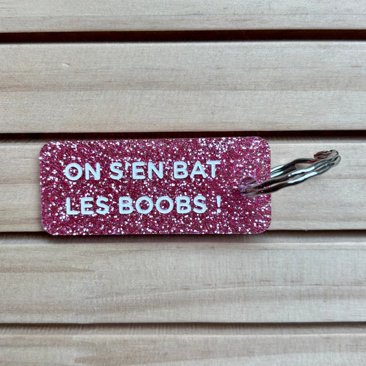 Porte-clés On s’en bat les boobs! fushia