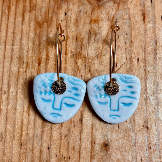Boucles d'oreilles en céramique visage bleu