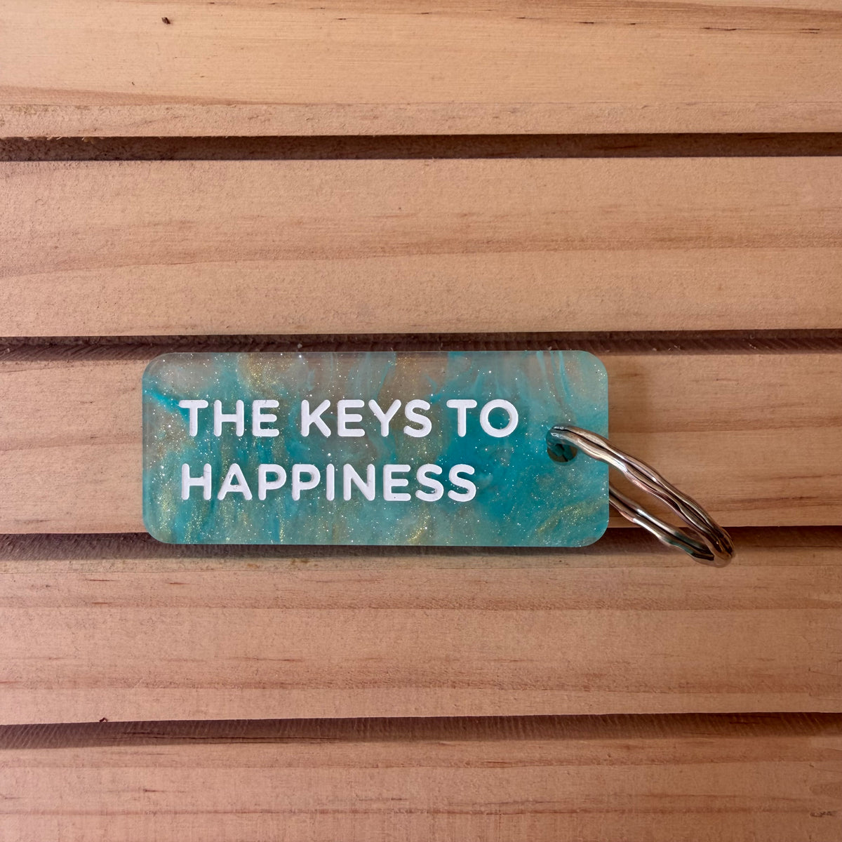 Porte-clés The Keys to happiness bleu piscine