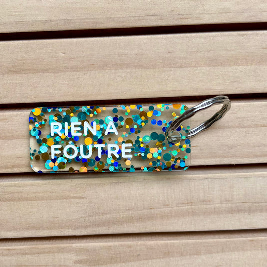 Porte-clés Rien à foutre bleu/or/vert