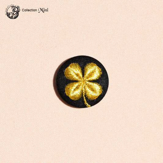 Broche Mini trèfle noir et doré