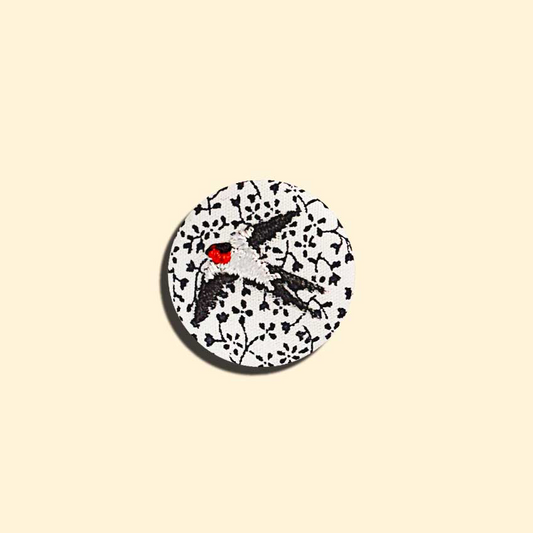 Broche Mini hirondelle noir et blanc