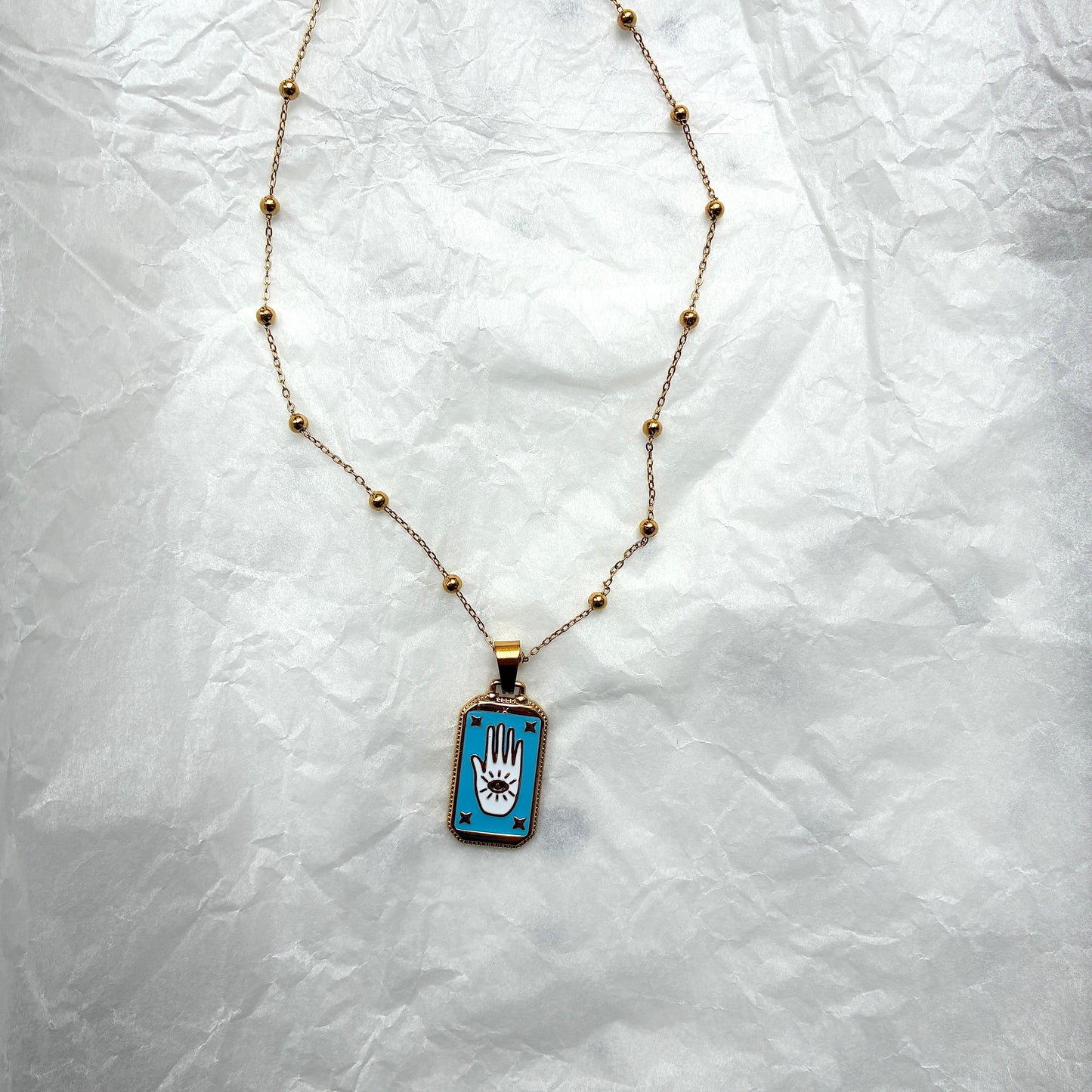 Collier Main bleu ciel