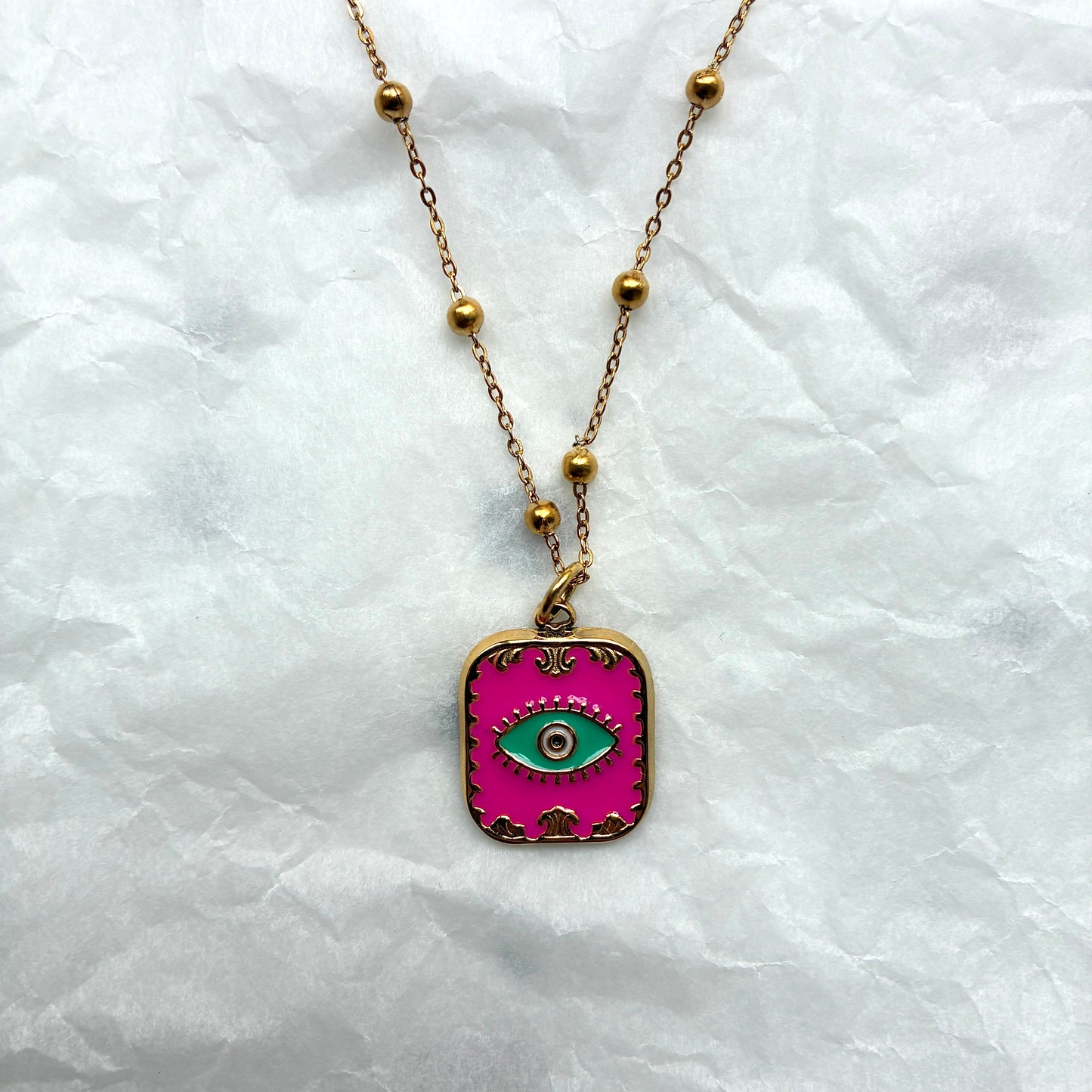 Collier Oeil fuschia