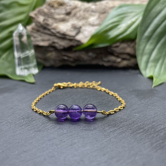 Bracelet doré triperle avec pierres semi-précieuses